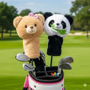 Fun animal head golf club covers for ladies, with a teddy bear and a panda design, sitting atop woods in a golf bag.