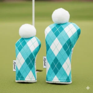 Two custom hybrid golf club covers designed for women, featuring a vibrant turquoise and white diamond pattern.