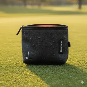 Close-up texture of the water-resistant canvas on the premium golf valuables pouch.