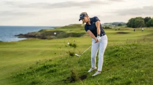 A skilled player executing a precise approach shot with scoring irons, highlighting forged irons for advanced golfers on the course.