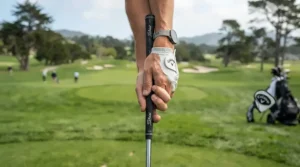 Proper address posture and grip demonstrated with golf irons for intermediate players